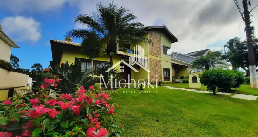 Condomínio arujá 5 - fantástica casa alto padrão à venda no arujá 5 com 4 suítes, hidromassagem, sauna e piscina!