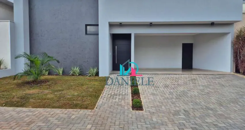Casa térrea com 3 suítes localizada no condomínio Village Damha I.