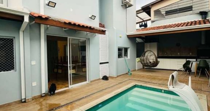Casa à venda, com 4 dormitórios sendo 3 suítes, piscina aquecida e churrasqueira na varanda. No bairro Jd das Indústrias, São José dos Campos - SP.