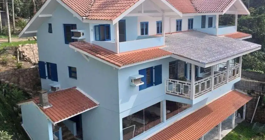 Casa no condomínio ponta das toninhas em ubatuba com 1100m², 5 dormitórios