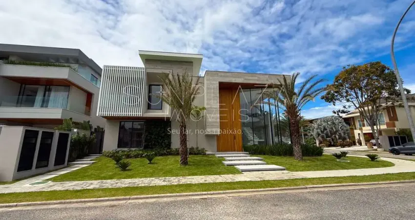 Casa à venda triplex com 5 suítes, elevador, piscina e espaço gourmet – condomínio alphaville barra da tijuca