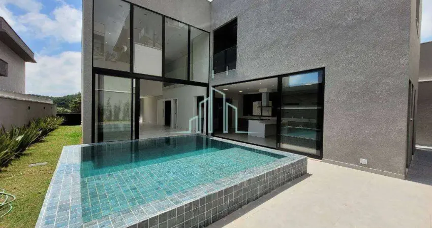 Casa com 4 dormitórios para alugar, 411m² por R$ 35.000/mês - Alphaville/SP