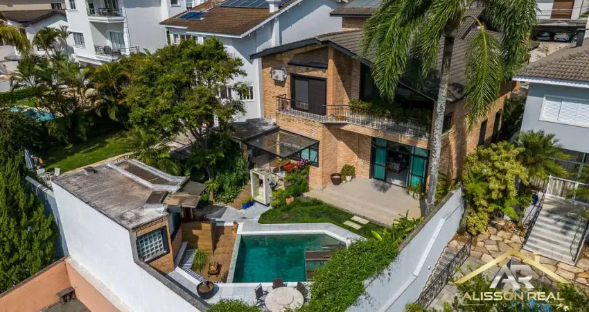 Casa de condomínio com 4 quartos e 5 banheiros à venda, 500 m².