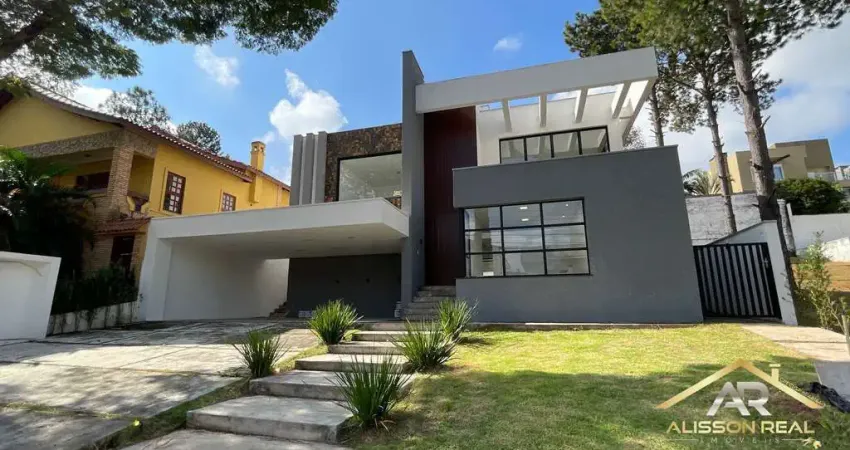 Linda Casa de 580m² com 4 Suítes, 4 Vagas, Piscina e SPA em Alphaville/SP.