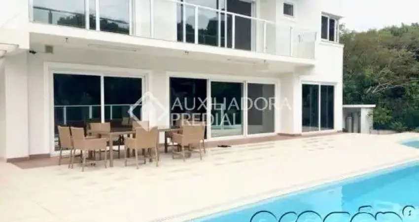 Casa com 6 quartos para alugar na Rua das Tibiras, 614, Jurerê Internacional, Florianópolis