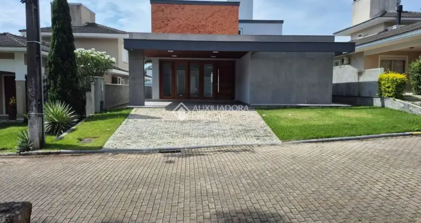 Casa em condomínio fechado com 4 quartos para alugar na Rua Leonel Pereira, 2239, Cachoeira do Bom Jesus, Florianópolis