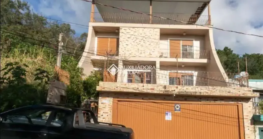 Casa em condomínio fechado com 4 quartos para alugar na Rua Professor Luiz Antônio Lopes, 530, Morro Santana, Porto Alegre