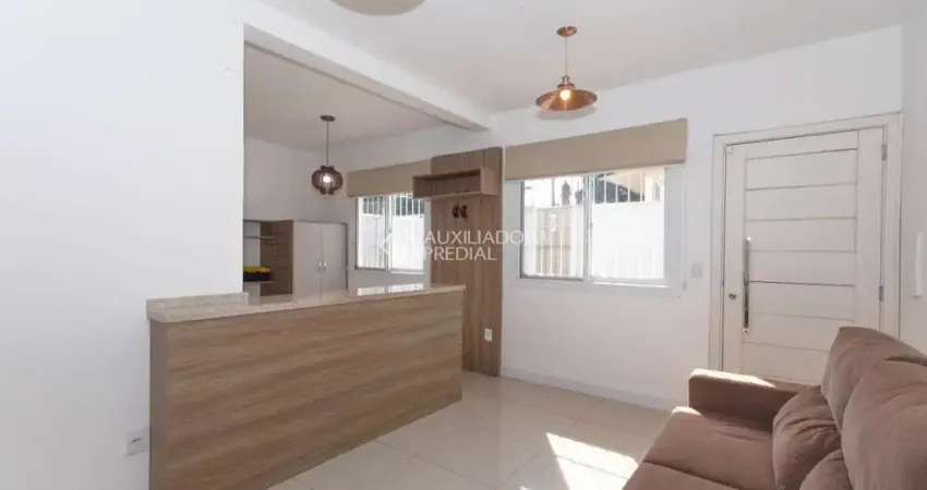 Casa em condomínio fechado com 2 quartos para alugar na Rua Tamoio, 3071, Niterói, Canoas