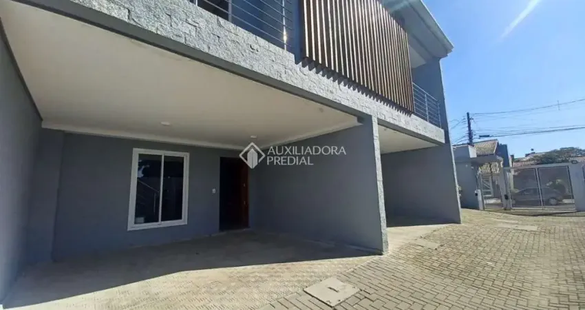 Casa em condomínio fechado com 3 quartos para alugar na Rua Rio Negro, 81, Igara, Canoas