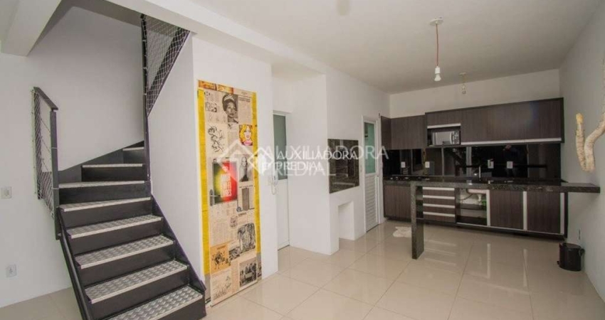 Casa em condomínio fechado com 2 quartos para alugar na Avenida Wenceslau Escobar, 3742, Tristeza, Porto Alegre