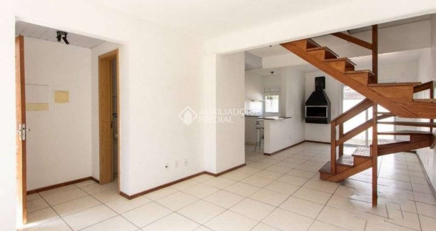 Casa em condomínio fechado com 3 quartos para alugar na Avenida Edgar Pires de Castro, 2520, Hípica, Porto Alegre
