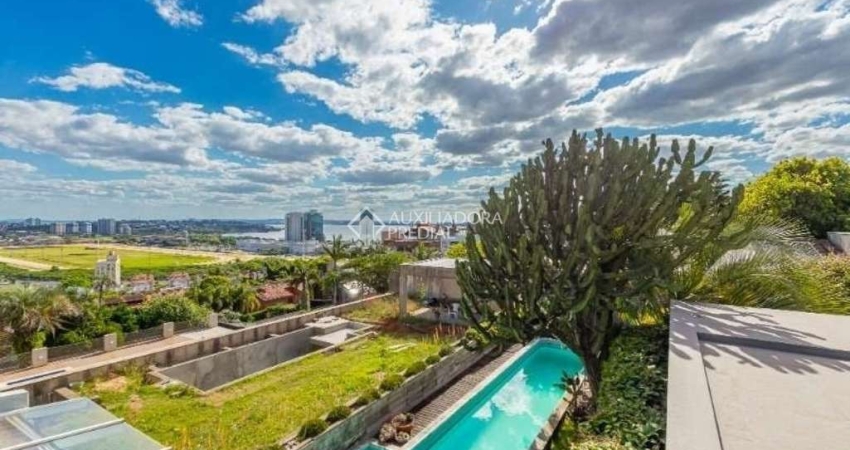 Casa em condomínio fechado com 4 quartos para alugar na Rua Curupaiti, 113, Cristal, Porto Alegre