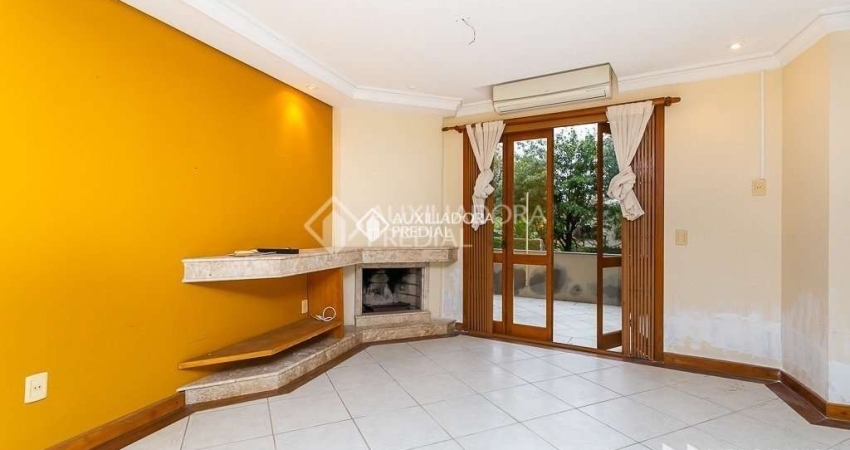 Casa em condomínio fechado com 3 quartos para alugar na Rua Padre João Batista Reus, 438, Vila Conceição, Porto Alegre