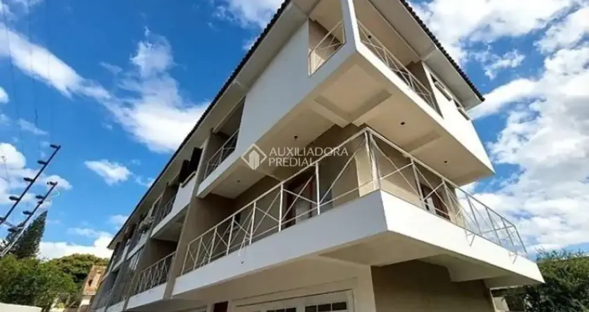 Casa em condomínio fechado com 3 quartos para alugar na Rua Jamil Antônio José, 46, Nonoai, Porto Alegre