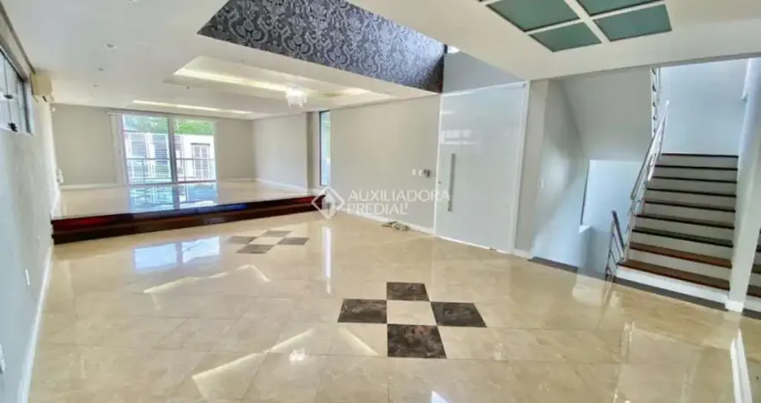 Casa em condomínio fechado com 4 quartos para alugar na Rua Claudio da Silva Pinto, 658, Espírito Santo, Porto Alegre