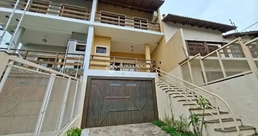 Casa em condomínio fechado com 3 quartos para alugar na Doutor Francisco Roberto Dall'Igna, 312, Espírito Santo, Porto Alegre