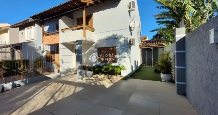 Casa em condomínio fechado com 2 quartos para alugar na Rua Norival Paranaguá de Andrade, 98, Hípica, Porto Alegre