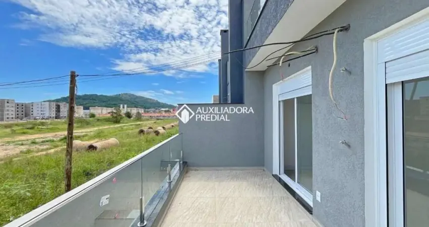 Casa em condomínio fechado com 3 quartos para alugar na Rua Guatambu, 473, Hípica, Porto Alegre