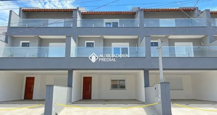 Casa em condomínio fechado com 3 quartos para alugar na Rua Guatambu, 467, Hípica, Porto Alegre