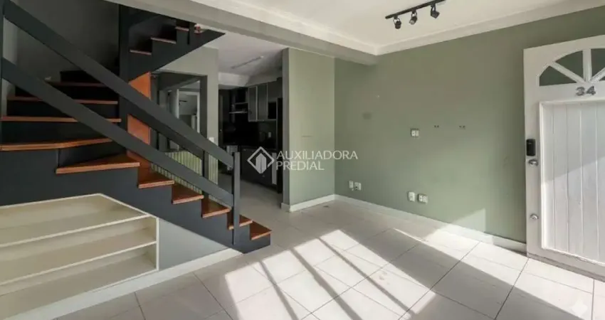 Casa em condomínio fechado com 2 quartos para alugar na Avenida da Cavalhada, 5075, Cavalhada, Porto Alegre