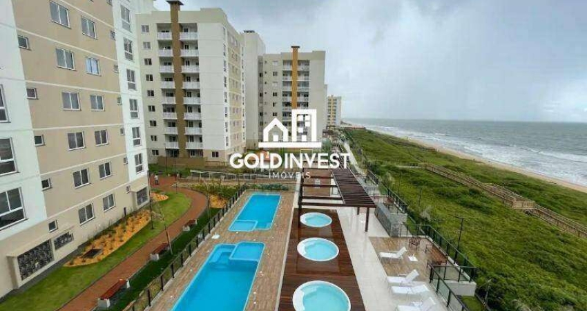 Apartamento em condomínio frente mar com lazer completo