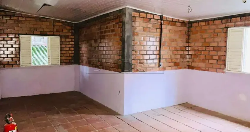 Casa comercial com 4 salas para alugar na Rua Miguel Tostes, 579, Rio Branco, Porto Alegre