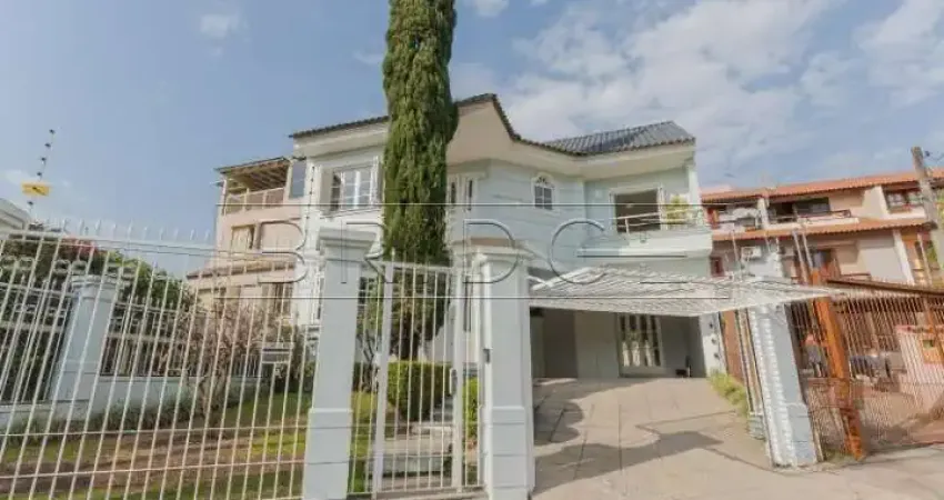 Casa em condomínio fechado com 3 quartos para alugar na Avenida Emílio Schlabitz Neto, 161, Alto Petrópolis, Porto Alegre