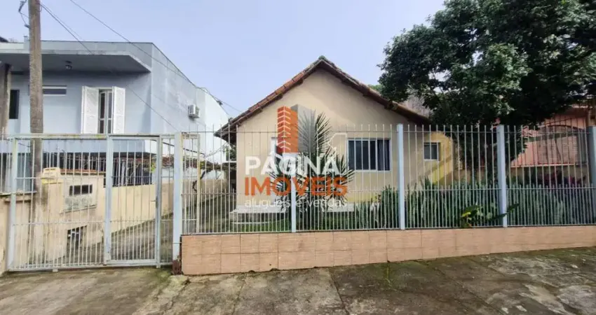 Página 1 Imóveis anuncia casa mista de 3 dormitórios com amplo terreno, para venda no bairro Nossa Senhora das Graças, Canoas/RS. - CA213