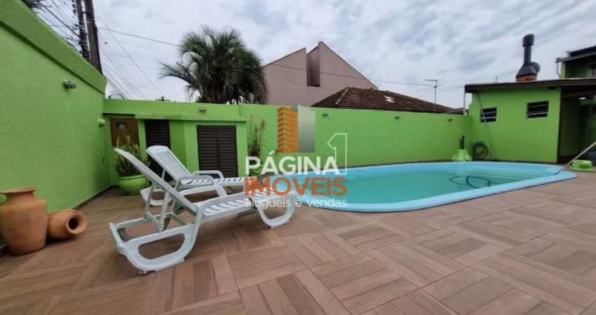 Página 1 Imóveis anuncia linda e aconchegante casa com piscina de 3 dormitórios no bairro São Luís em Canoas/RS. - CA95