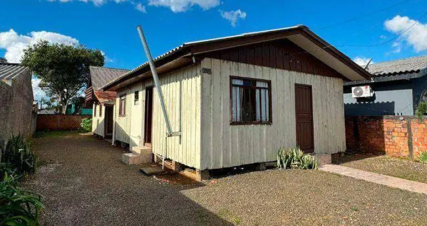 Terreno com 360m² contendo uma casa de madeira à venda, por R$ 250.000 - Primavera - Guarapuava/PR