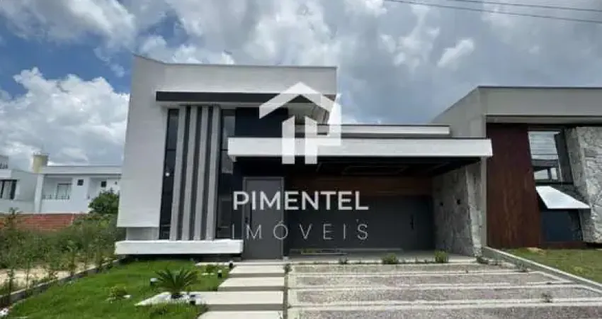 Casa na região da ponta negra com 03 suítes (sendo a master com closet) | sala com pé direito duplo | cozinha americana com ilha e piscina