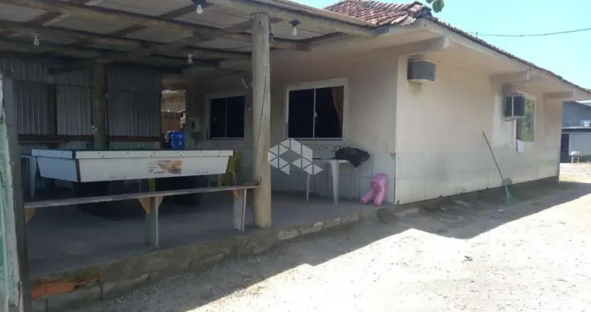 Casa 3 Dormitórios / Quartos  no bairro Barra Aririu - Palhoça a Venda por R$ 336.000,00  .