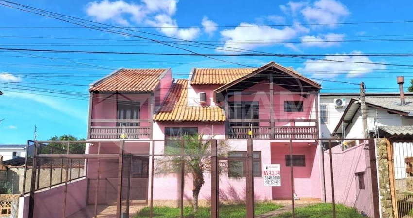 Casa com 5 quartos à venda na Rua Vidal de Negreiros, 644, Vila São José, Porto Alegre