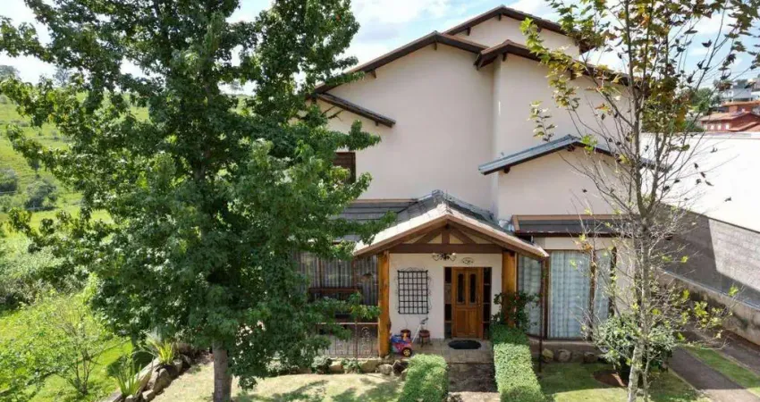 Casa com 3 suítes à venda, 381 m² por R$ 1.450.000 - Condomínio Terras de Santa Cruz - Bragança Paulista/SP