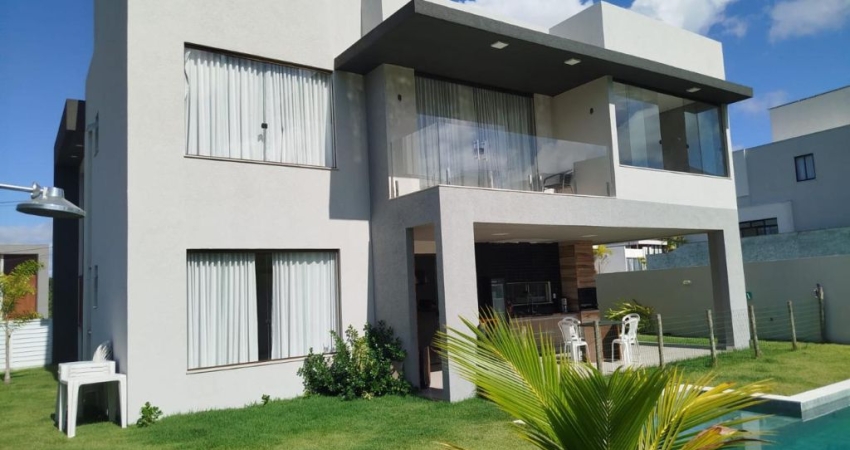 Alugo Casa Mobiliada 4/4 suítes no Alphaville Litoral Norte 3