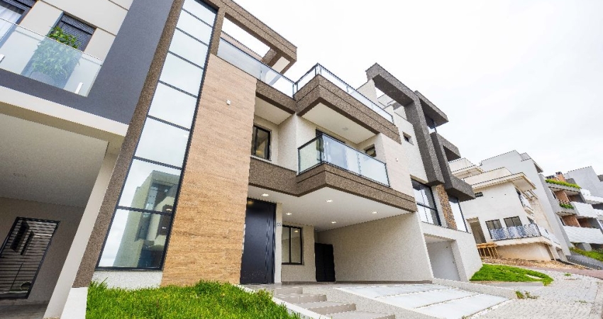 CASA EM CONDOMÍNIO COM 3 SUÍTES E TERRAÇO
