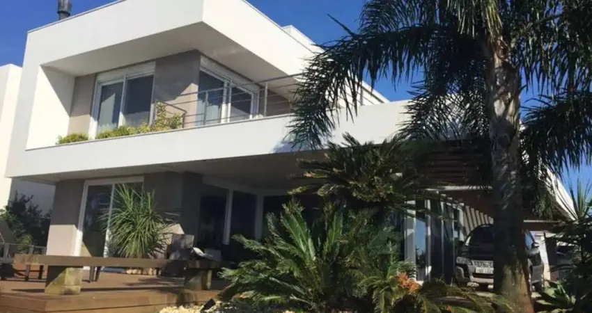 Casa em condomínio fechado com 4 quartos à venda no Centro, Xangri-Lá 