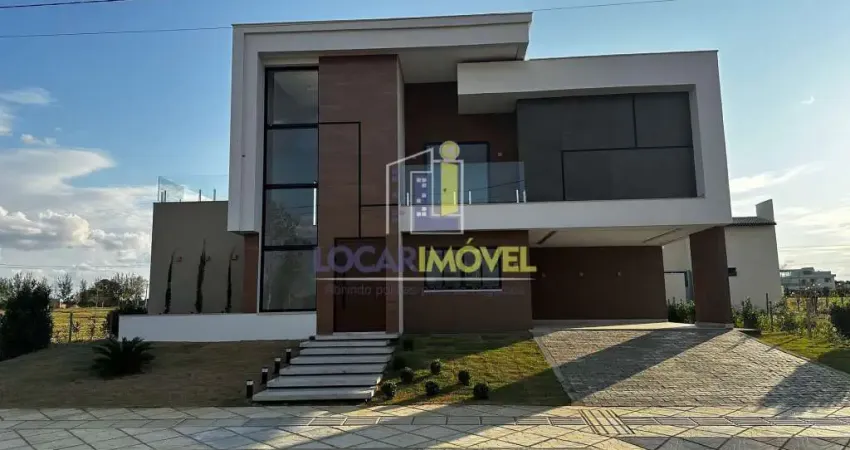 Casa de alto padrão com 2 pavimentos, área gourmet com churrasqueira, em condomínio fechado, no Har