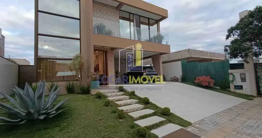 Casa de 5 quartos sendo 3 suítes  + dependência completa, sala ampla,  cozinha espaçosa, espaço gou