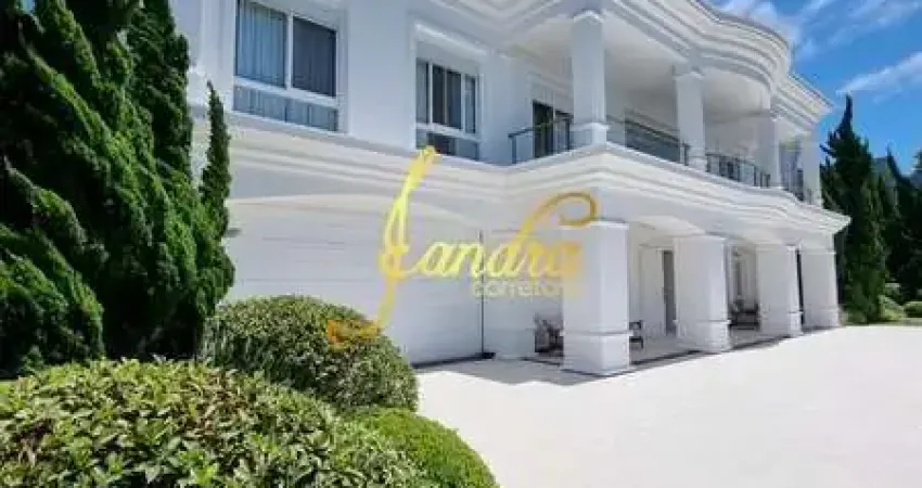 Sobrado novo enseada com 04 suítes, com dois lotes beira lago