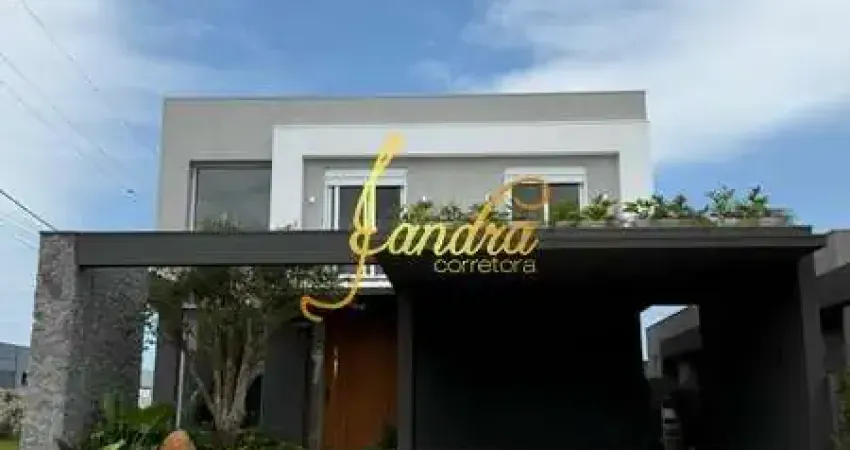 Sobrado condomínio fechado com 05 suítes e piscina beira lago