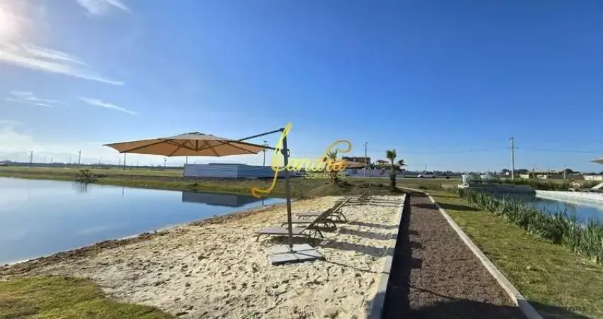 Lote área central do condomínio beira lago pronto para construir