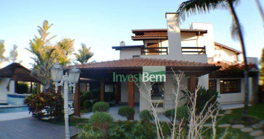 Casa com 4 dormitórios à venda, 732 m² por R$ 2.850.000,00 - Condomínio Chácara Flora - Valinhos/SP