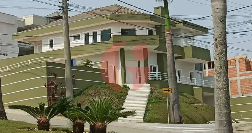 Sobrado em condomínio para venda com 04 quartos (5 suítes) e 08 vagas de garagem - 900m² no Jaguary