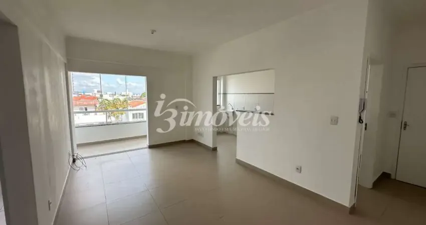Apartamento para locação anual, com 2 quartos (sendo uma suíte), 1 vaga de garagem, no bairro centro, navegantes-sc