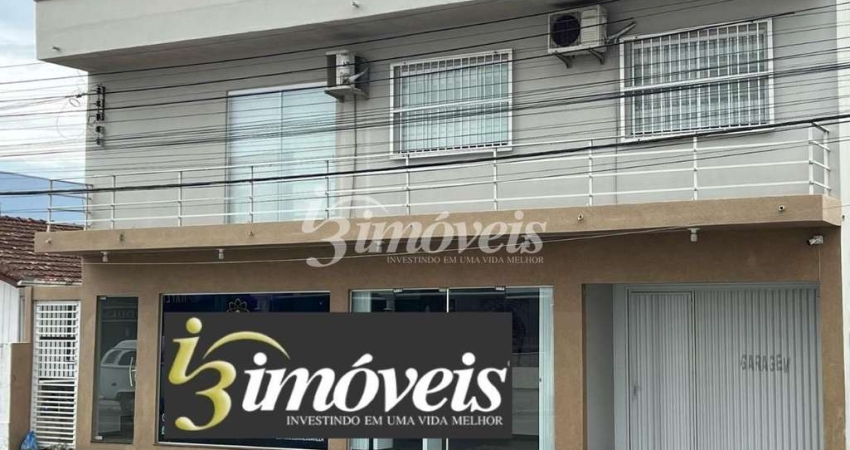 Imóvel comercial e residencial à venda, 7 salas, 3 quartos, sendo 1 suíte, bairro Centro, Navegantes SC