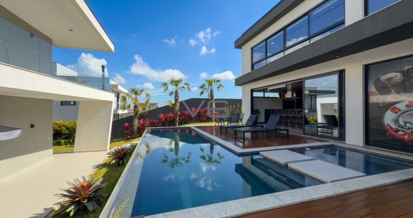 Casa alto padrão com 4 quartos sendo 3 suítes, 5 vagas de garagem, no Jardim Amélia,