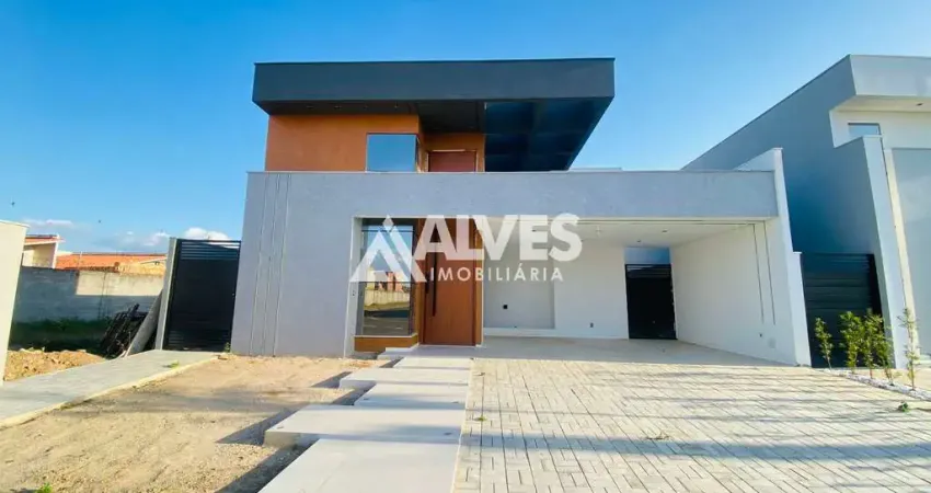 Casa com 3 suítes e áera com gourmet em condomínio de alto padrão