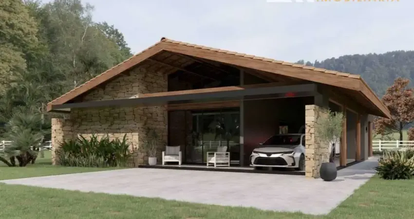 Casa de campo com 3 quartos sendo 1 suíde e área gourmet em condomínio