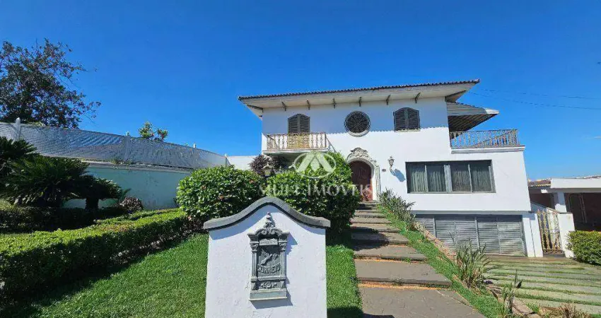 Casa de Alto Padrão Residencial/Comercial localizada no Bairro Ribeirânia, terreno de 1703m² e 862,73m² de área construída, 6 suítes.